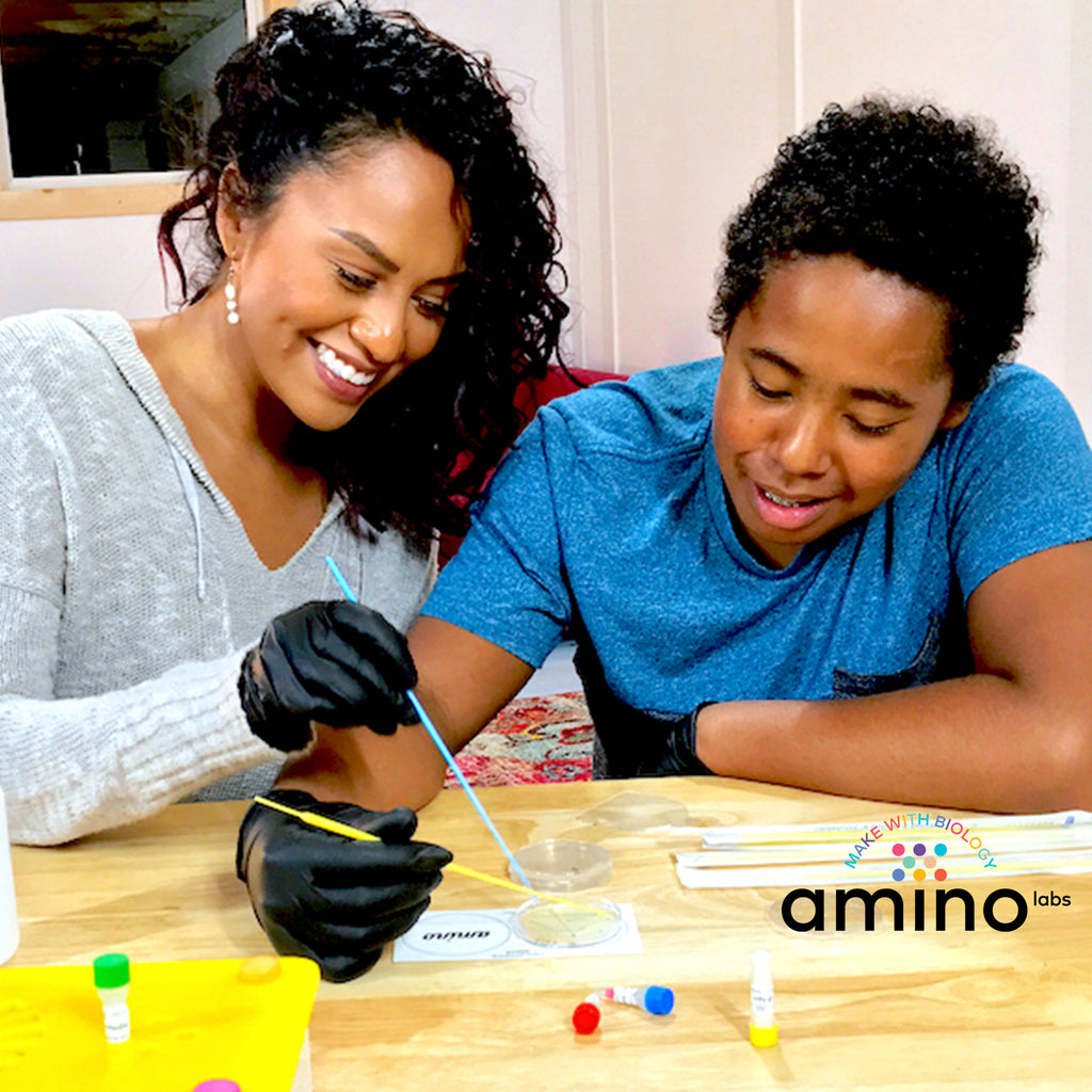 Family science experiments, STEM experiments as part of Amino Labs' Zero to Genetic Engineering hero starter pack -  Learn what is DNA, what is a gene, cell theory, genetic engineering, bioart, biotechnology, biohacking and genetic engineering with the world's first biohacking and biotechnology STEM beginner's starter kits
